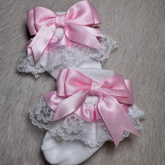 White socks with pink bow 0-18m